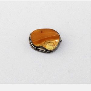 Sterling silver and Baltic egg yolk amber pin